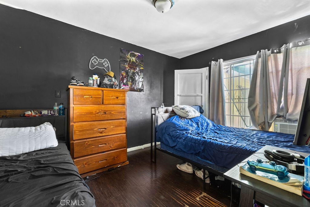 4237 Abbott Road Lynwood, CA 90262 - Photo 15 of 39 a bed room with a bed and a window
