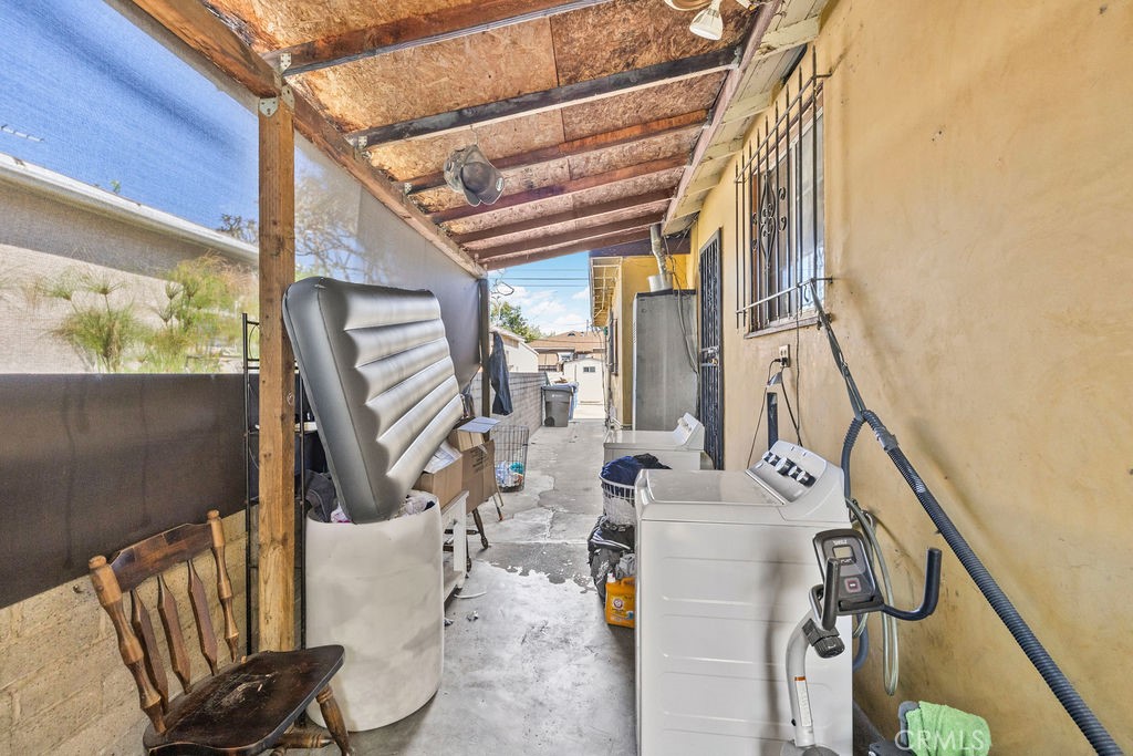 4237 Abbott Road Lynwood, CA 90262 - Photo 27 of 39 a view of living room with furniture and wooden floor