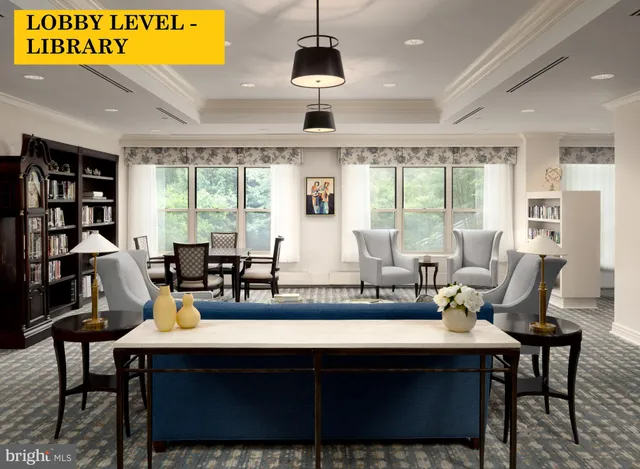 a view of a livingroom with furniture and workspace