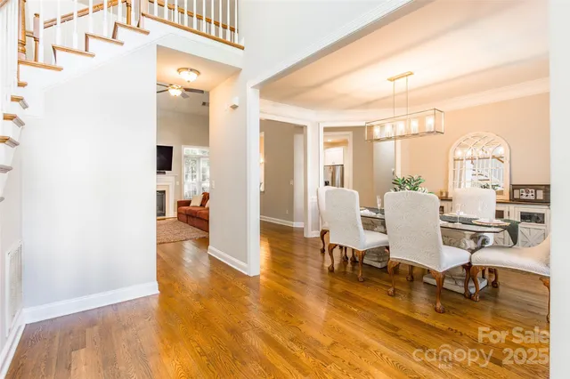 a view of a living room and dining room