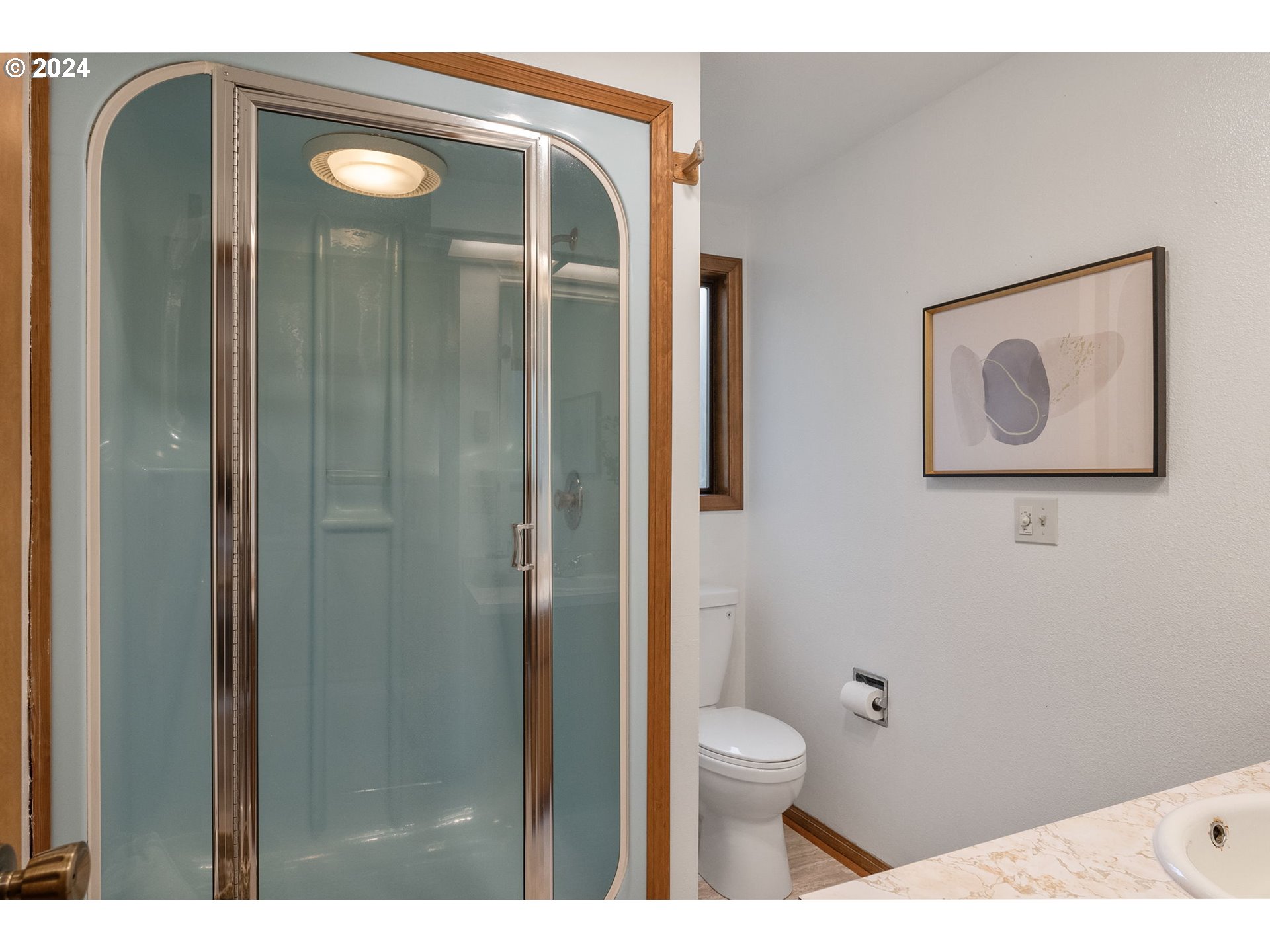 1995 West 34th Avenue Eugene, OR 97405 - Photo 25 of 47 a bathroom with a toilet sink and shower