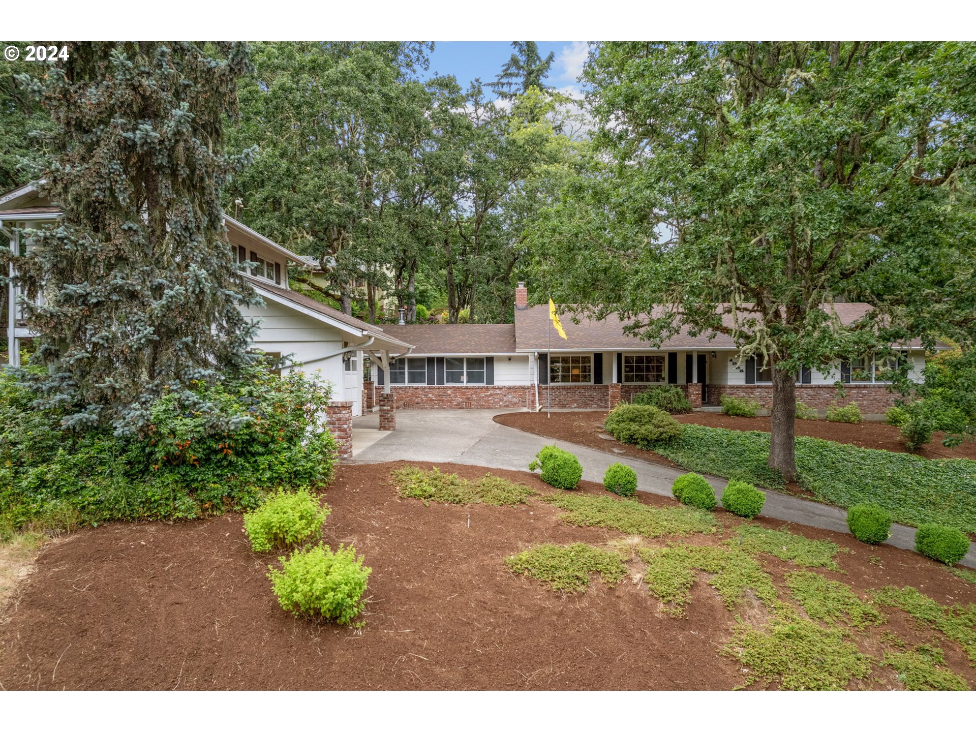 1995 West 34th Avenue Eugene, OR 97405 - Photo 41 of 47 a front view of a house with a yard