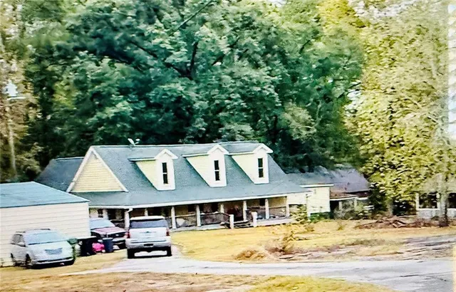 a view of a house with a swimming pool