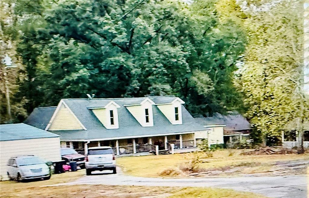 a view of a house with a swimming pool