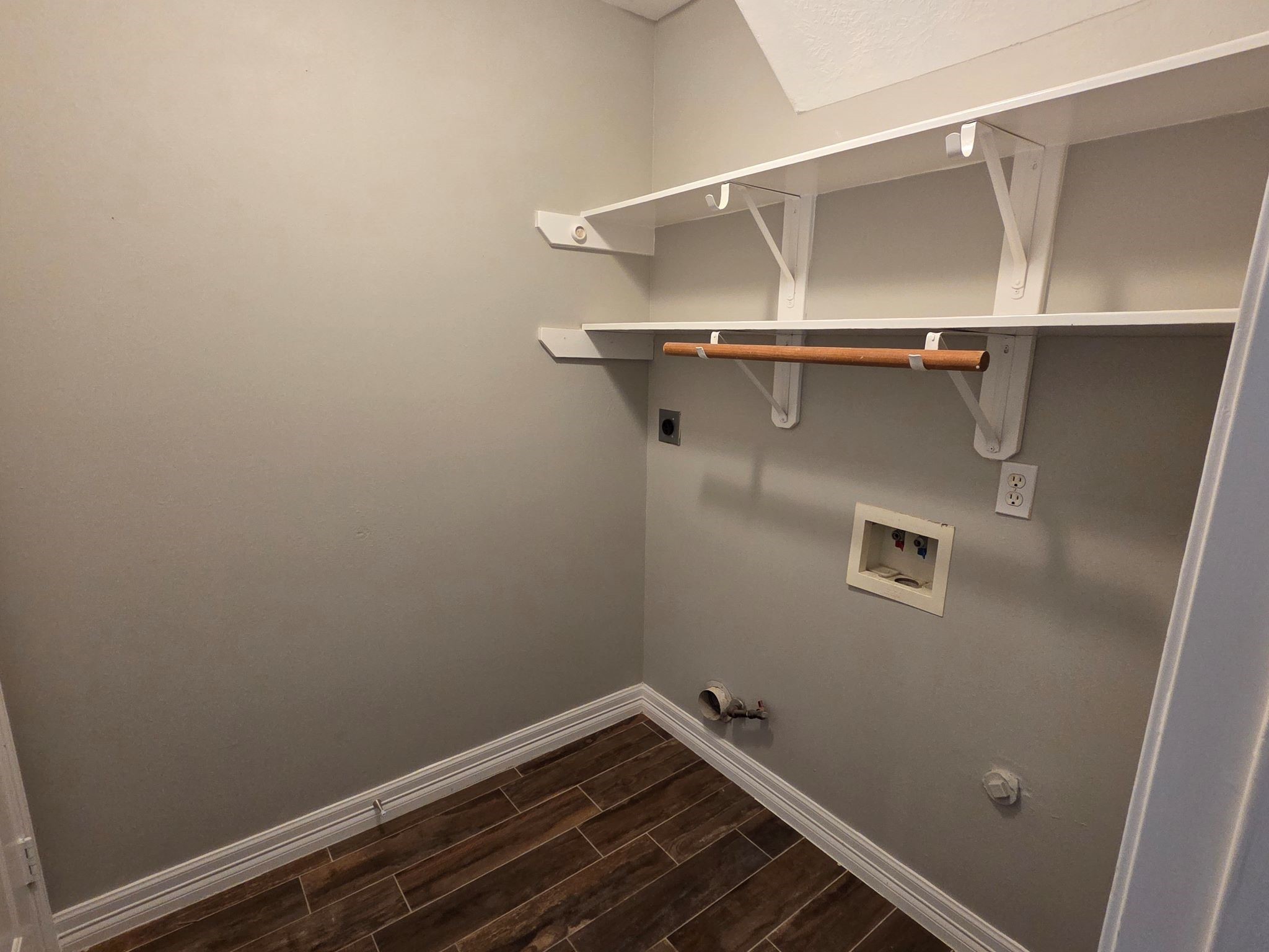 8214 Point Pendleton Drive Tomball, TX 77375 - Photo 22 of 42 a view of a room with racks on the wall