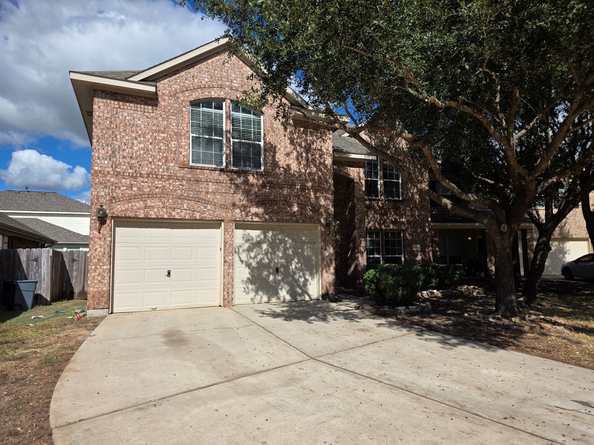 8214 Point Pendleton Drive Tomball, TX 77375 - Photo 3 of 42 a front view of a house with a yard