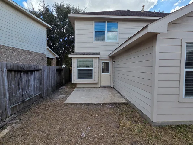 a view of backyard of house