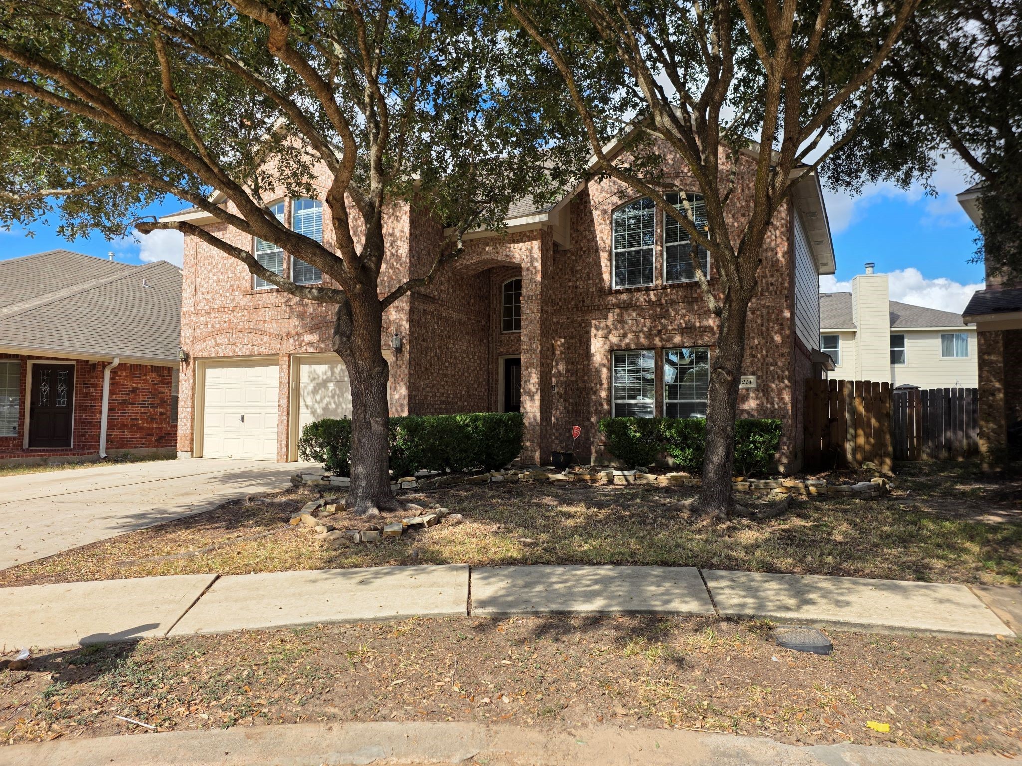 8214 Point Pendleton Drive Tomball, TX 77375 - Photo 6 of 42 a view of a house with a yard covered in snow