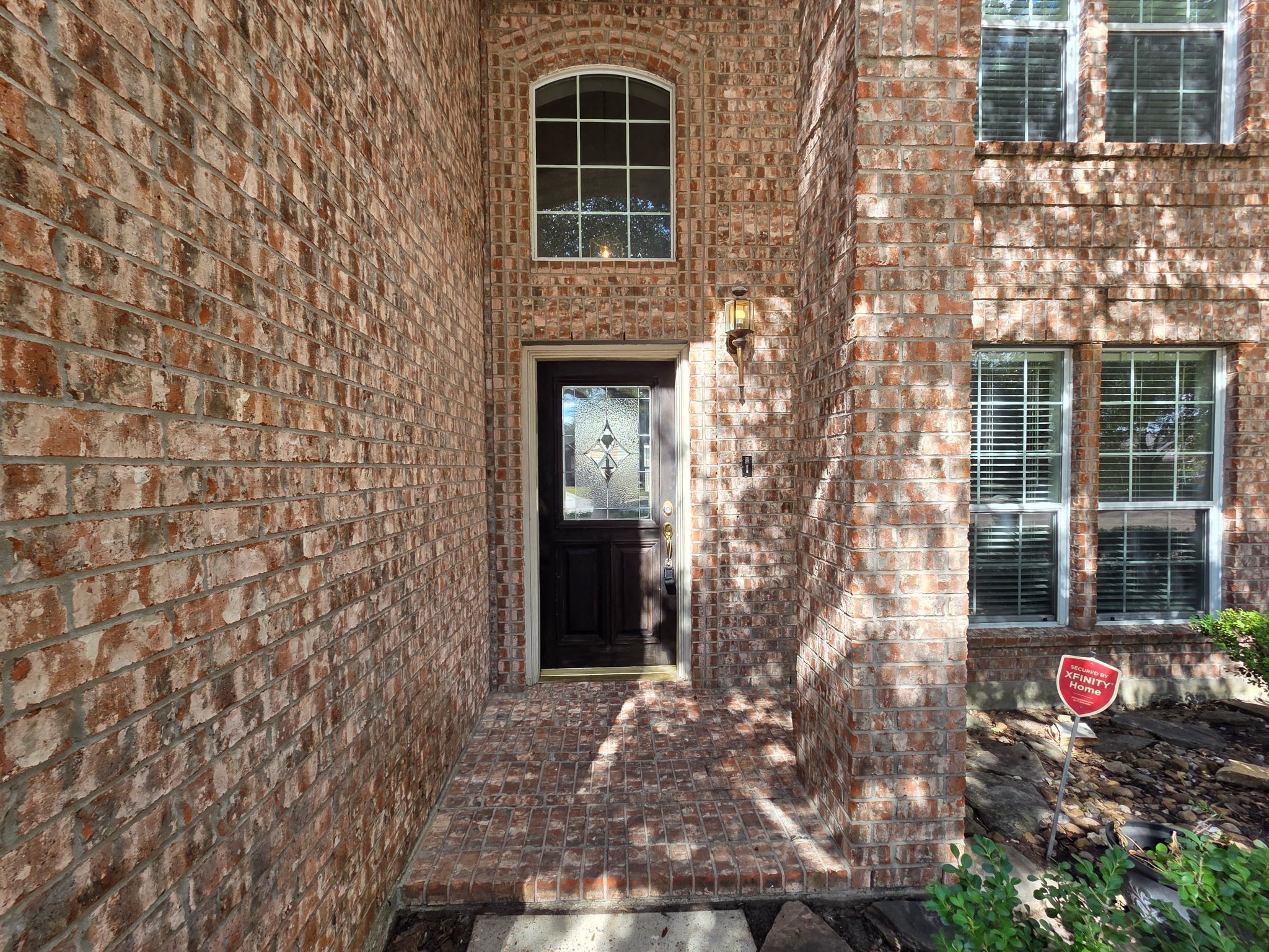 8214 Point Pendleton Drive Tomball, TX 77375 - Photo 7 of 42 a front view of a house with a yard