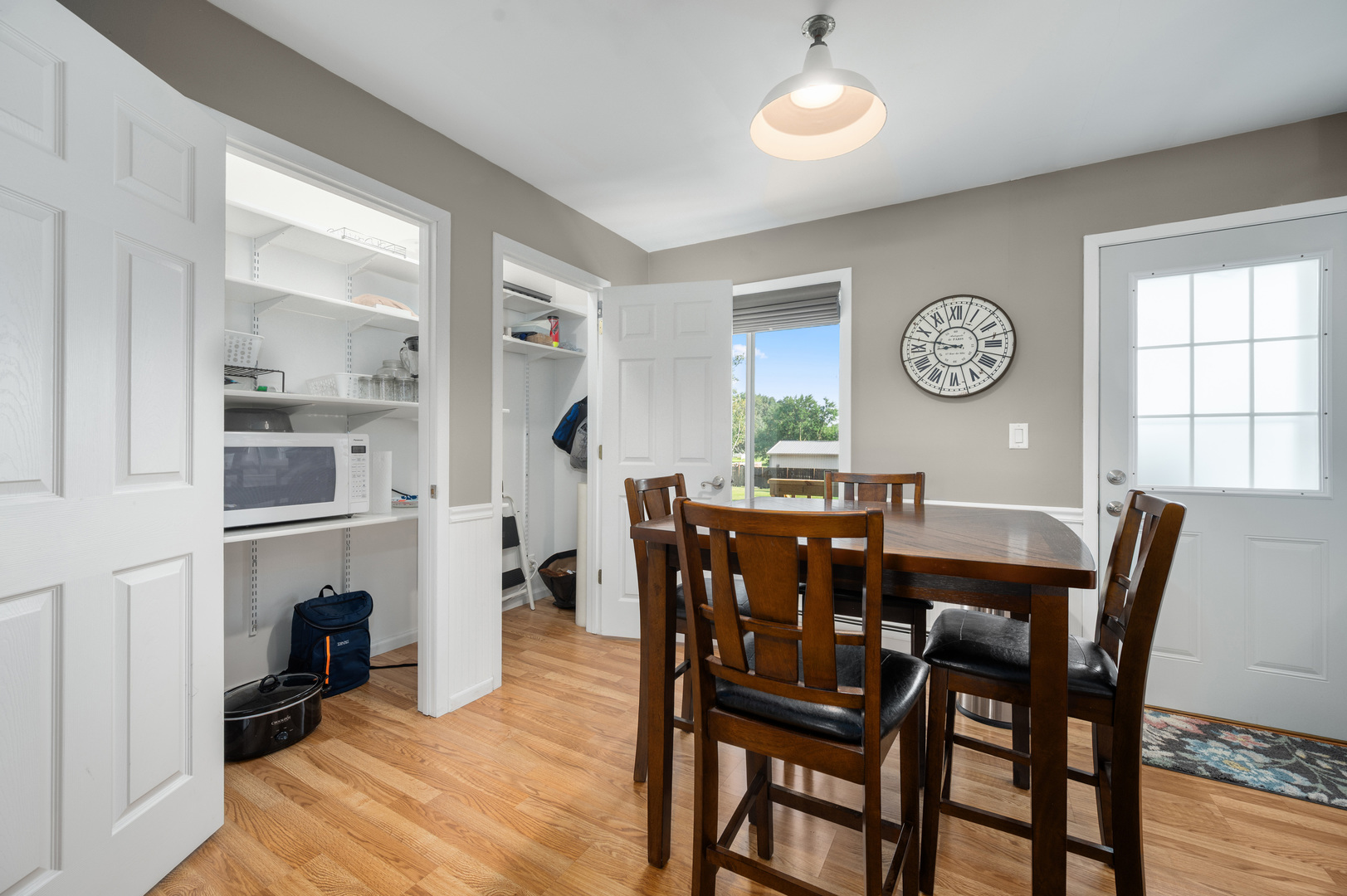 13344 Base Line Road Kingston, IL 60145 - Photo 23 of 38 a view of a dining room with furniture and a large window