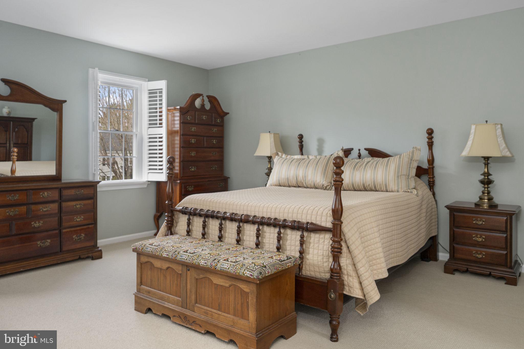 207 Overcreek Road Phoenixville, PA 19460 - Photo 24 of 47 a bedroom with a bed and a dresser