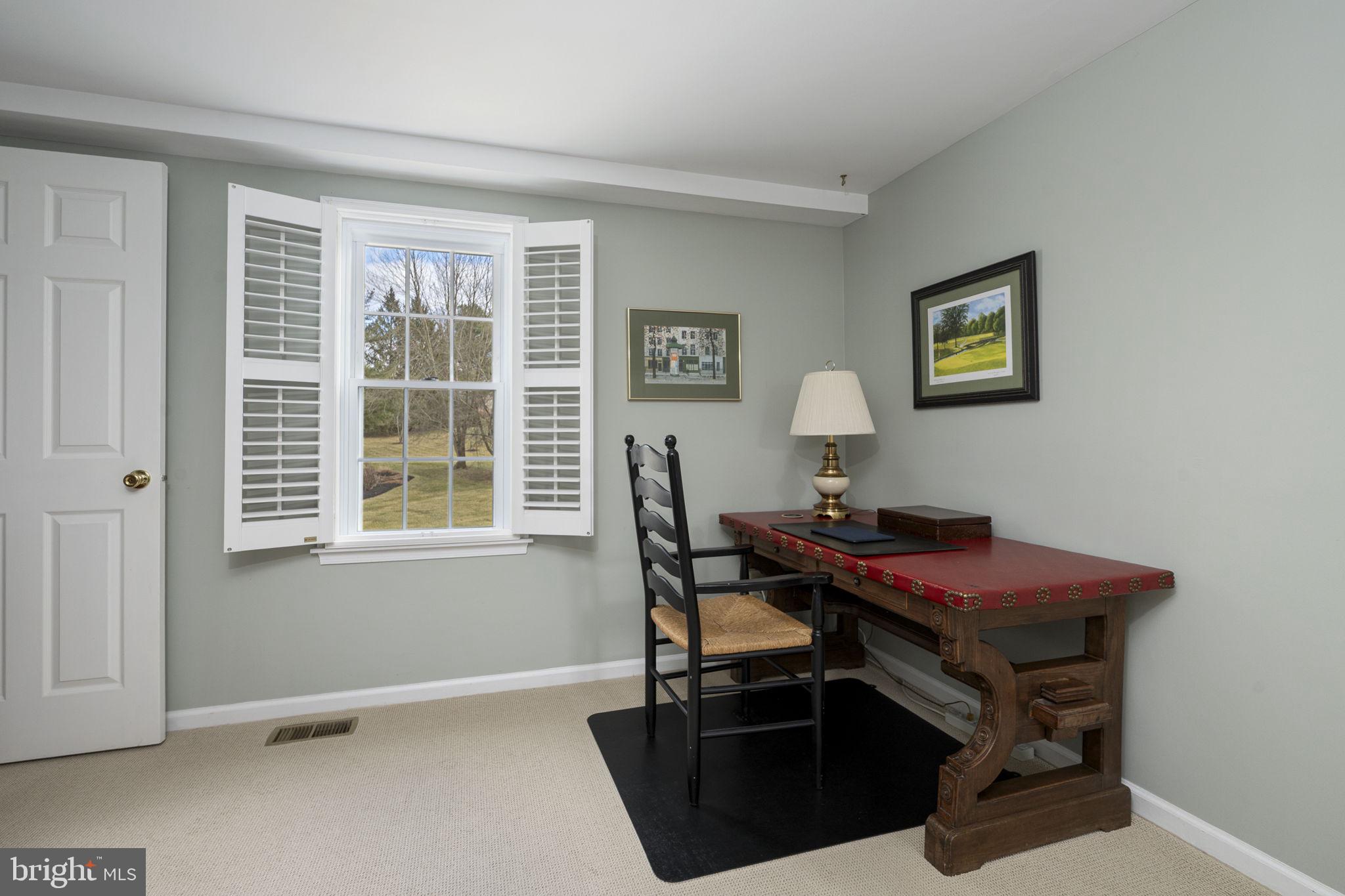 207 Overcreek Road Phoenixville, PA 19460 - Photo 31 of 47 a view of a workspace with furniture and a window