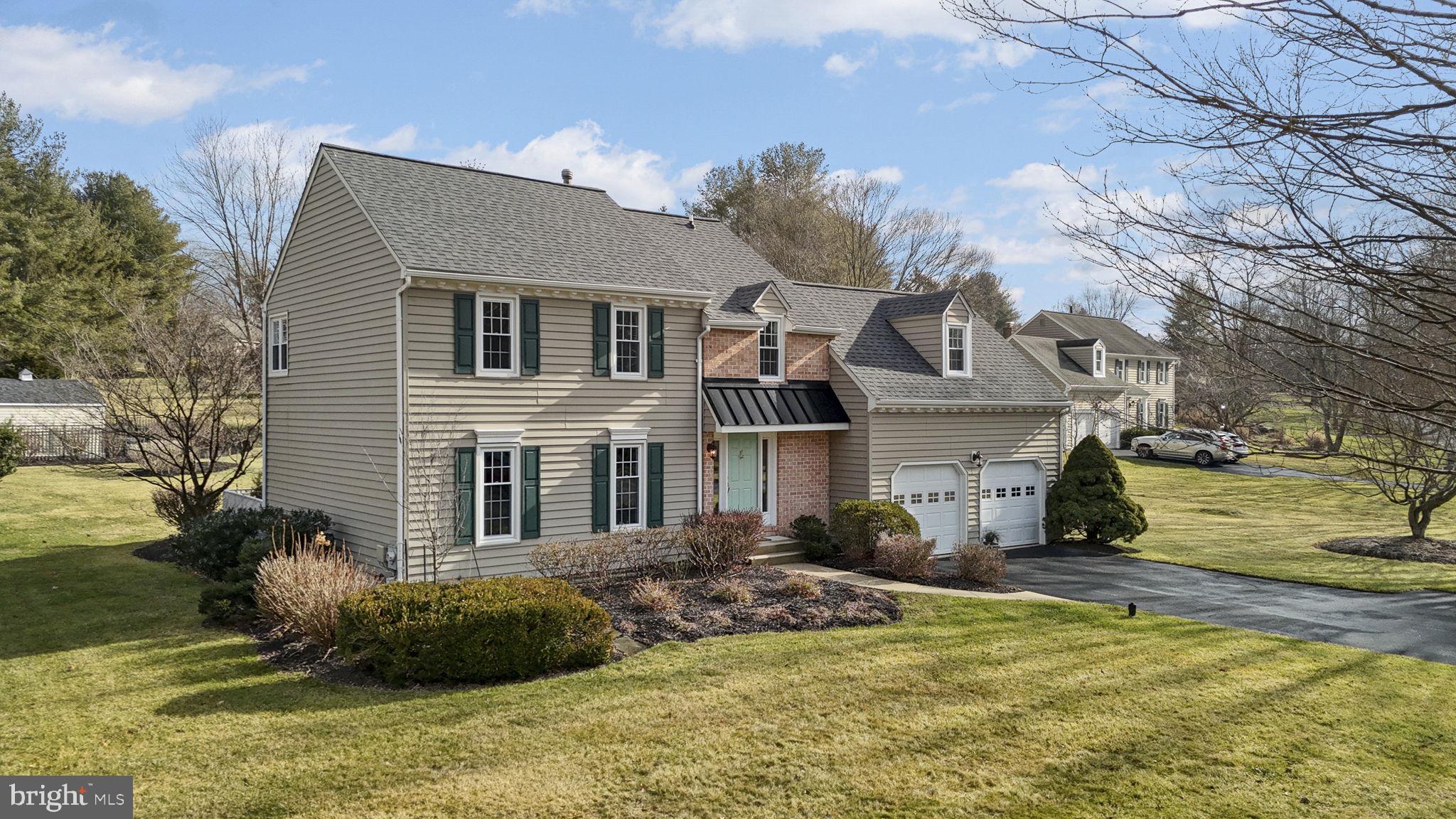 207 Overcreek Road Phoenixville, PA 19460 - Photo 5 of 47 a front view of a house with a yard