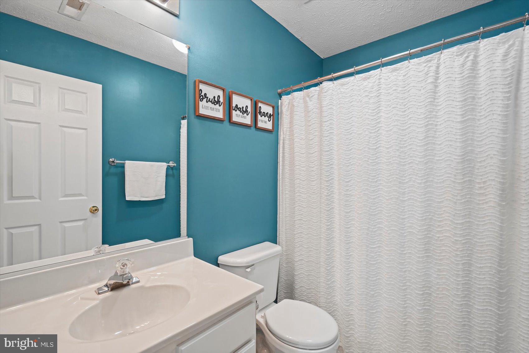 16 Kendersham Court Rosedale, MD 21237 - Photo 29 of 40 Upper Level - Hallway Full Bathroom