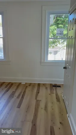 a view of bathroom with bathtub and window