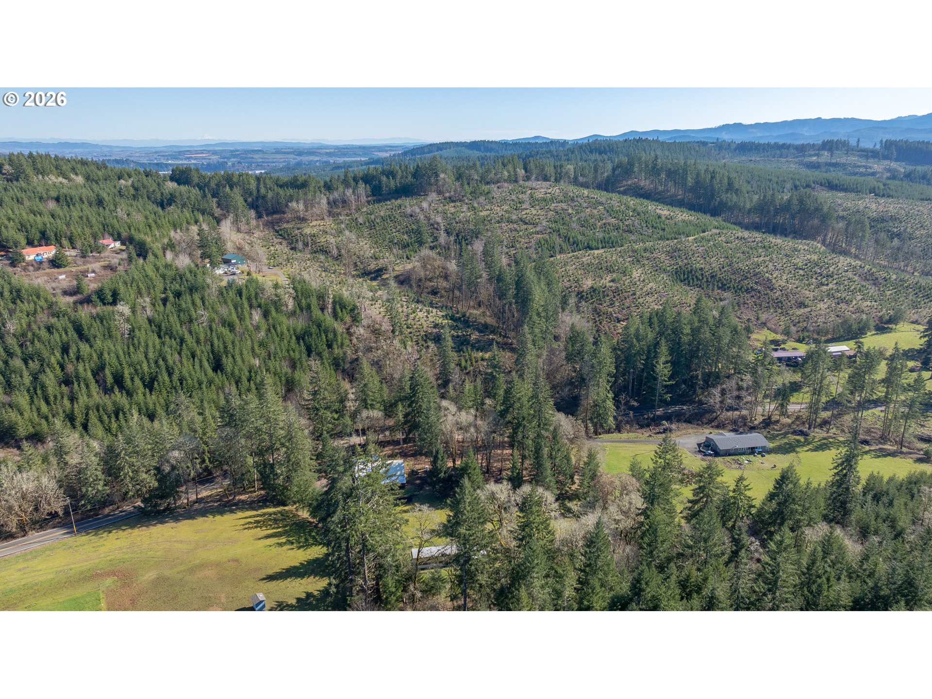 42480 Southwest Fort Hill Road Willamina, OR 97396 - Photo 20 of 35 a open area with mountains in the background