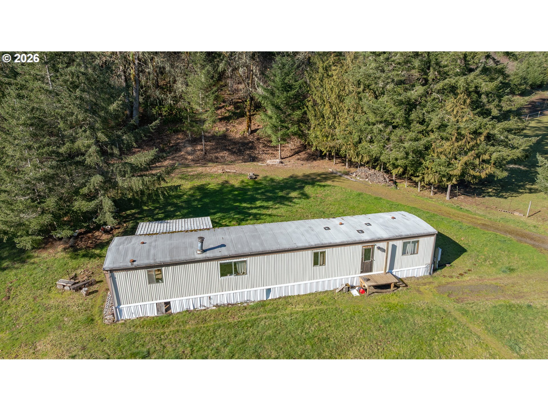 42480 Southwest Fort Hill Road Willamina, OR 97396 - Photo 4 of 35 a balcony with a yard