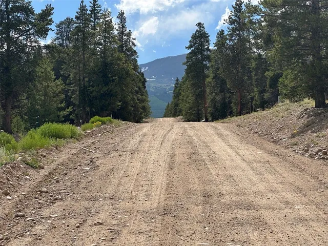 a view of a backyard of the house