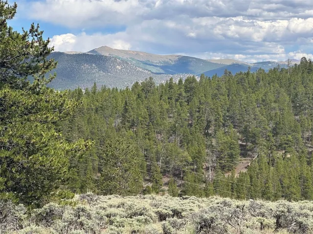 a view of a lake with a building in the background