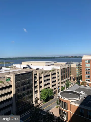 a living room with a couch and a stove top oven