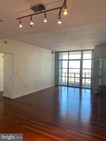a kitchen with a stove a sink and a refrigerator