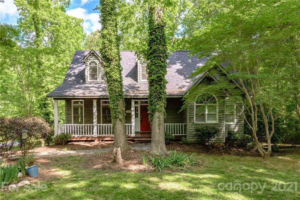 712 Lochaven Road Waxhaw, NC 28173 - Photo 2 of 38 a view of a house with a garden