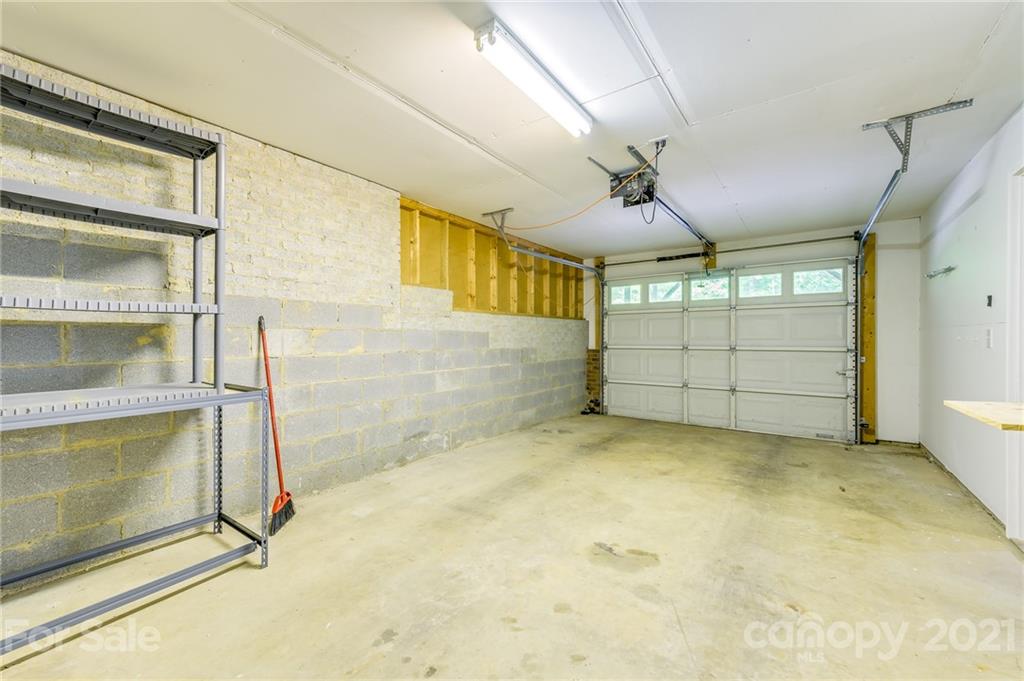 712 Lochaven Road Waxhaw, NC 28173 - Photo 28 of 38 a view of a room with cabinet and mirrors
