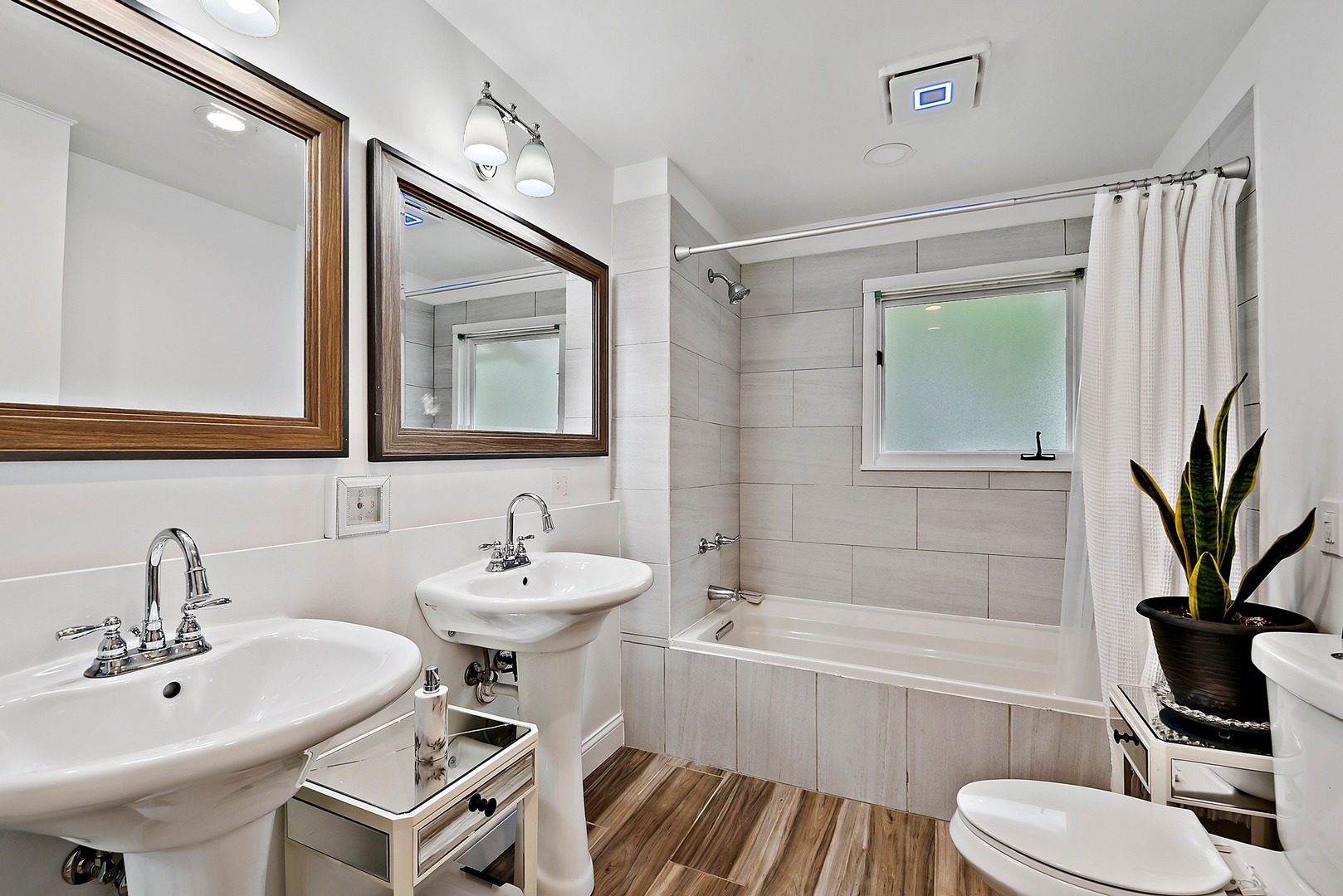 7710 Brookbank Road Willowbrook, IL 60527 - Photo 12 of 20 a bathroom with a sink and a mirror