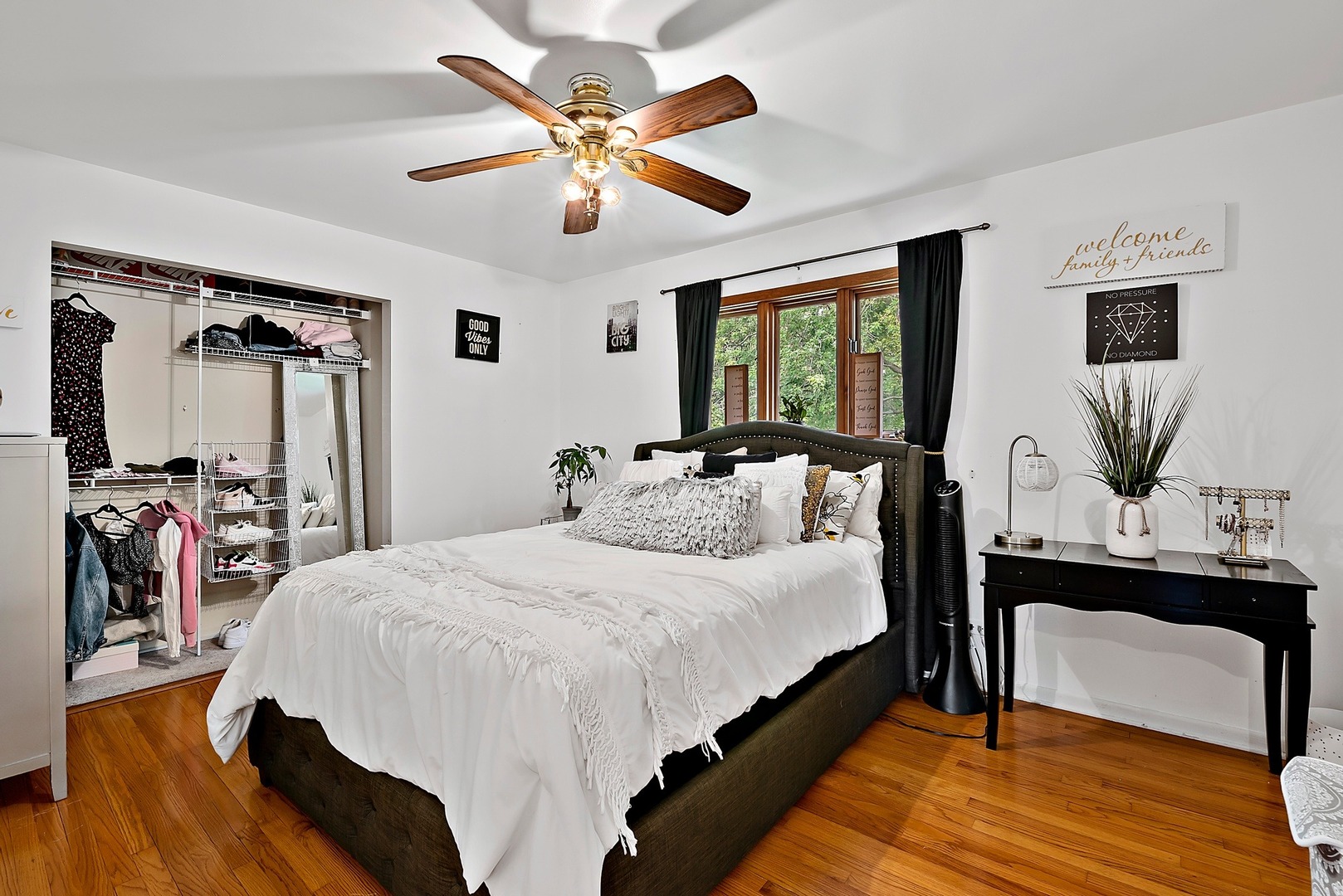 7710 Brookbank Road Willowbrook, IL 60527 - Photo 13 of 20 a bedroom with a bed and wooden floor