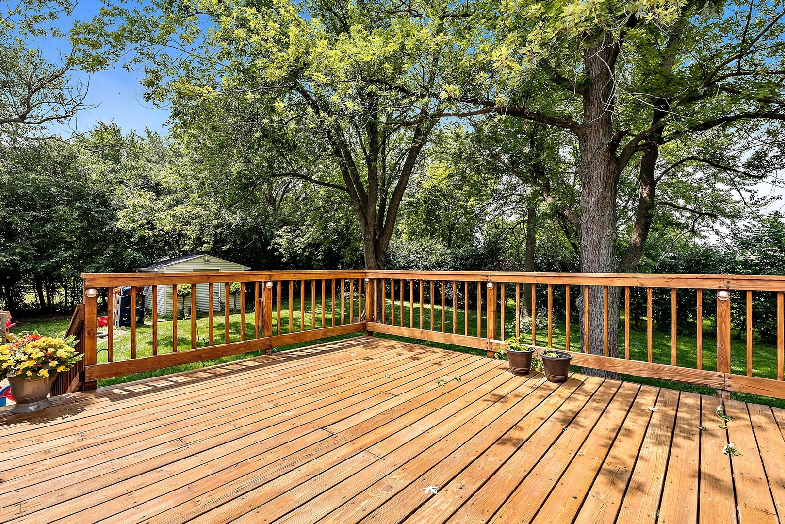 7710 Brookbank Road Willowbrook, IL 60527 - Photo 14 of 20 a view of balcony with wooden floor and fence