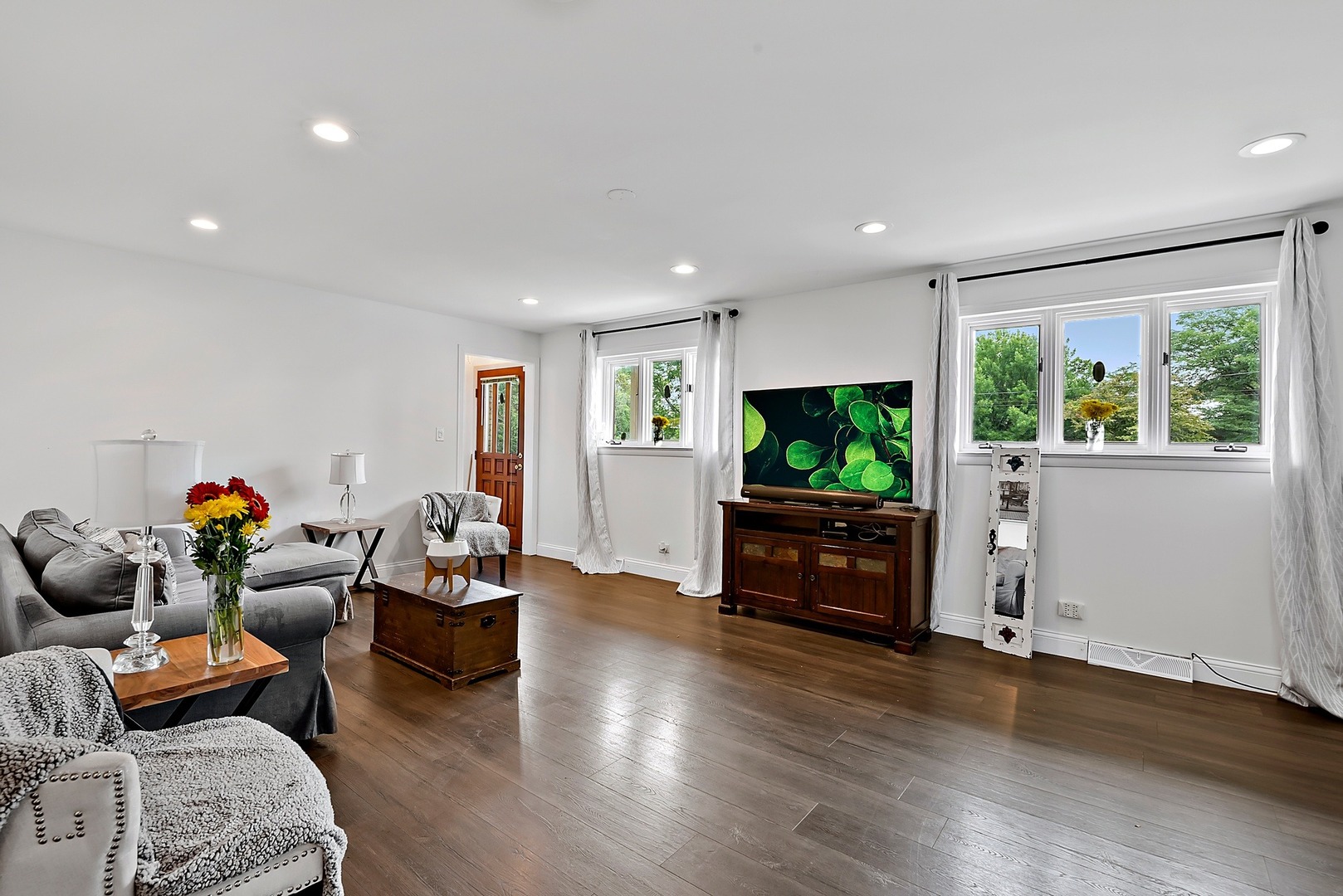 7710 Brookbank Road Willowbrook, IL 60527 - Photo 7 of 20 a living room with furniture and a flat screen tv
