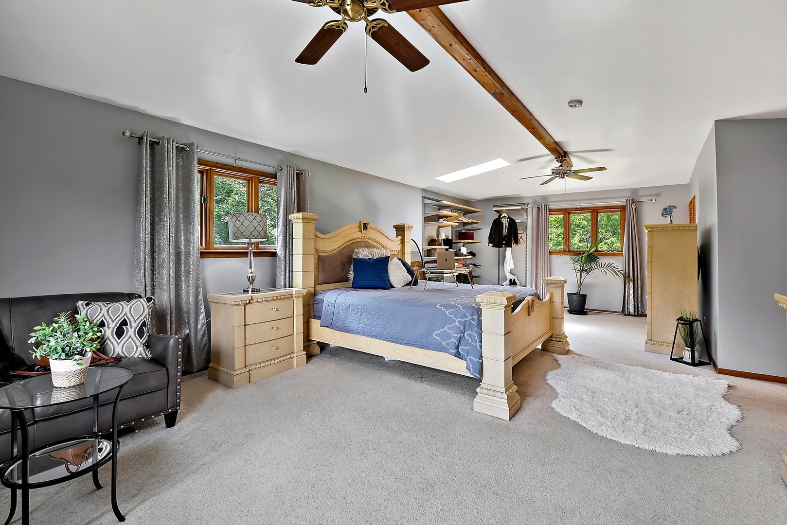 7710 Brookbank Road Willowbrook, IL 60527 - Photo 10 of 20 a bed room with furniture and a flat screen tv