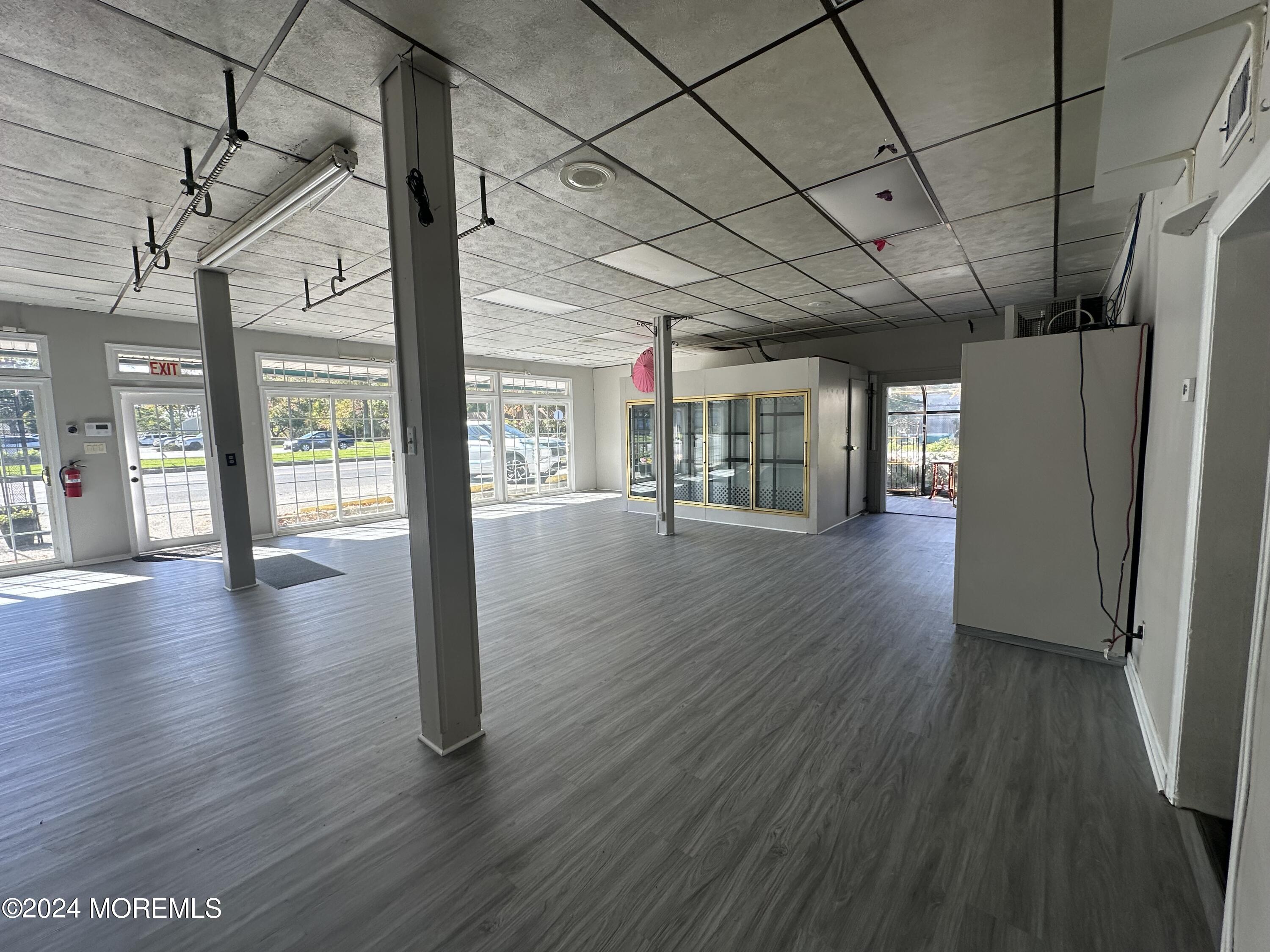 570 Mantoloking Road Brick, NJ 08723 - Photo 16 of 23 a view of a room with wooden floors