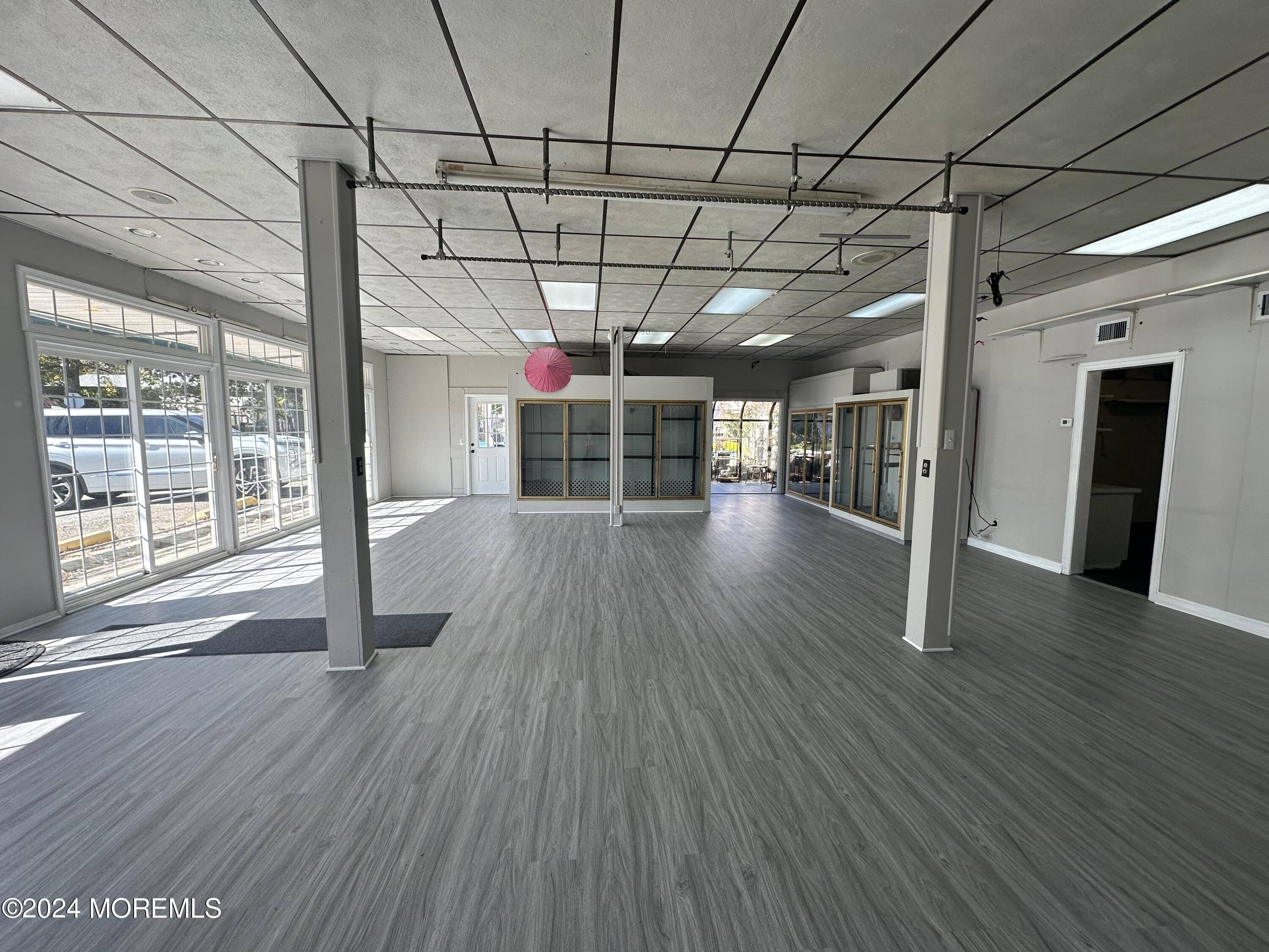 570 Mantoloking Road Brick, NJ 08723 - Photo 17 of 23 a view of a room with wooden floor
