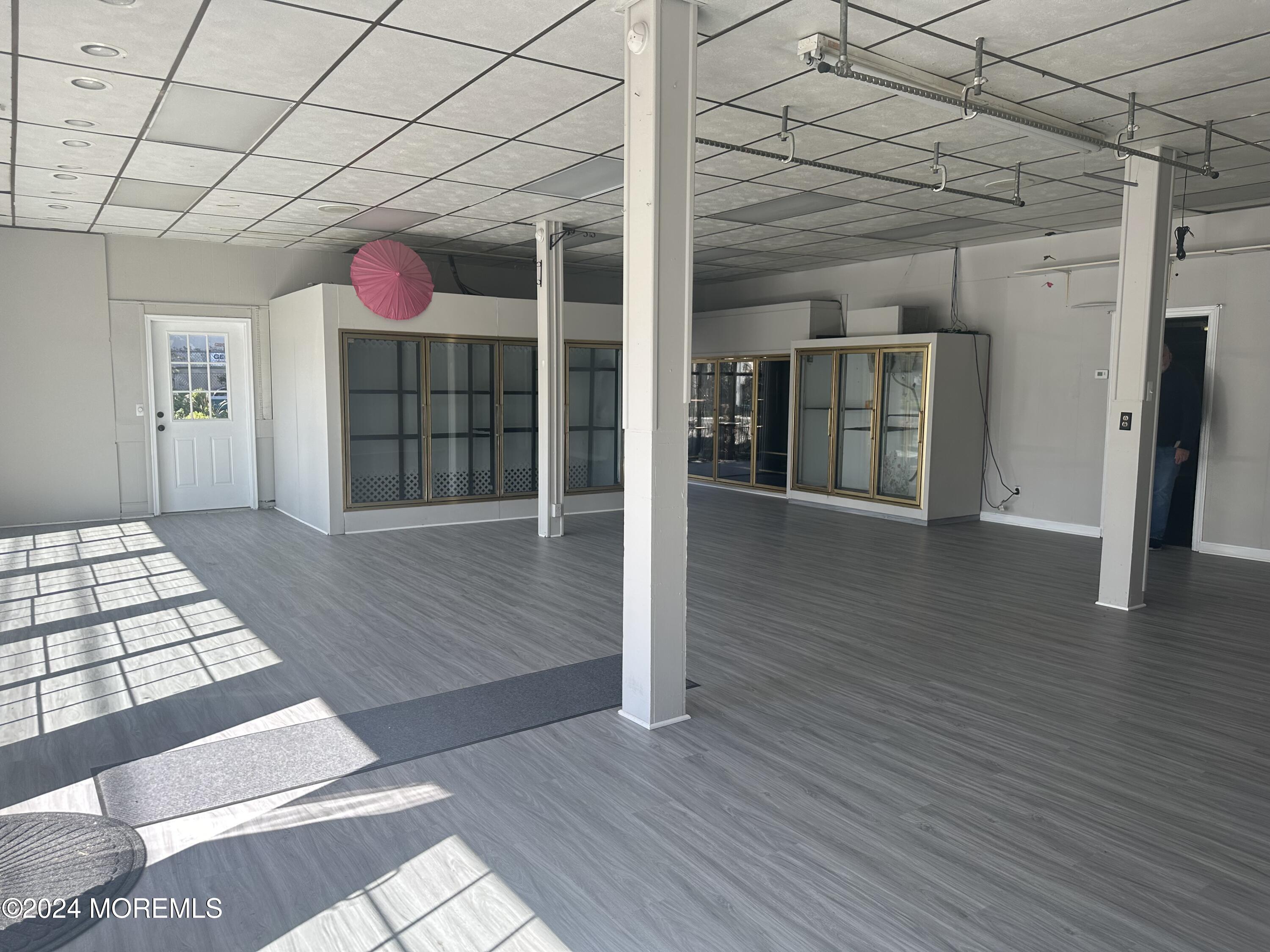 570 Mantoloking Road Brick, NJ 08723 - Photo 18 of 23 a view of a room with wooden walls and stairs