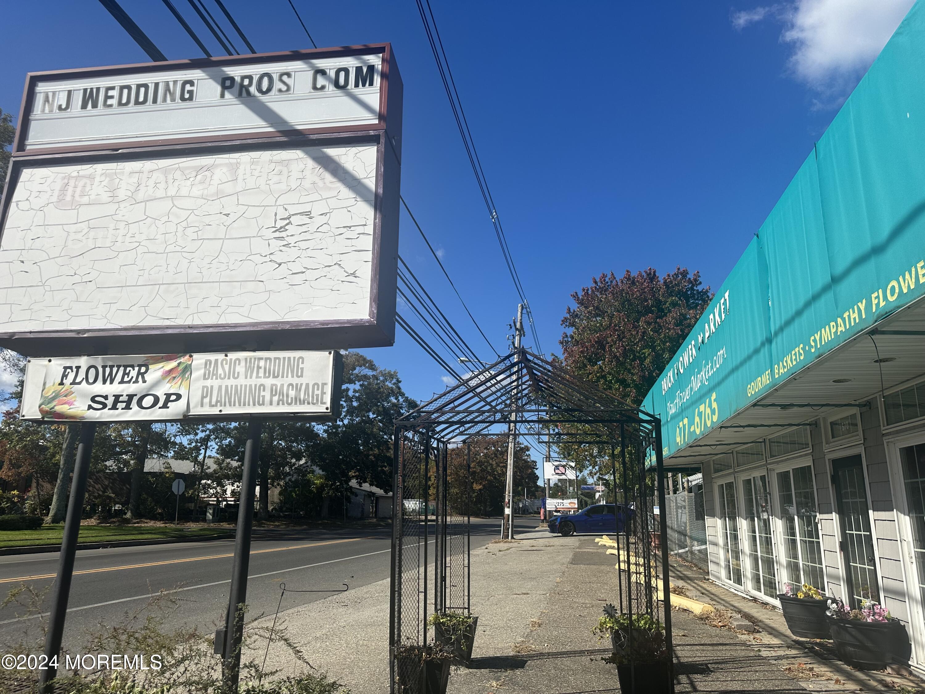 570 Mantoloking Road Brick, NJ 08723 - Photo 21 of 23 a view of a street sign