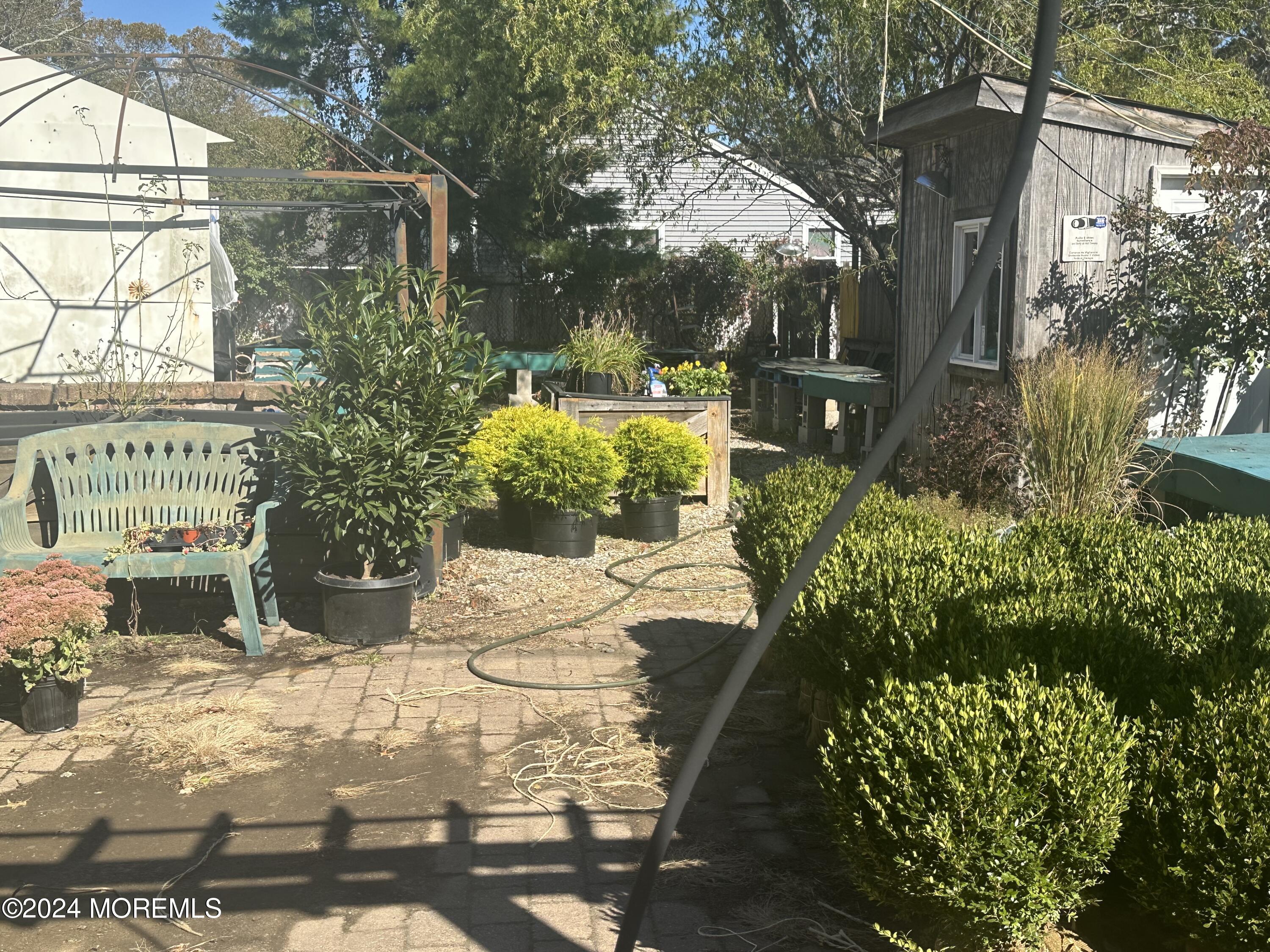 570 Mantoloking Road Brick, NJ 08723 - Photo 10 of 23 a view of a pathway of a house