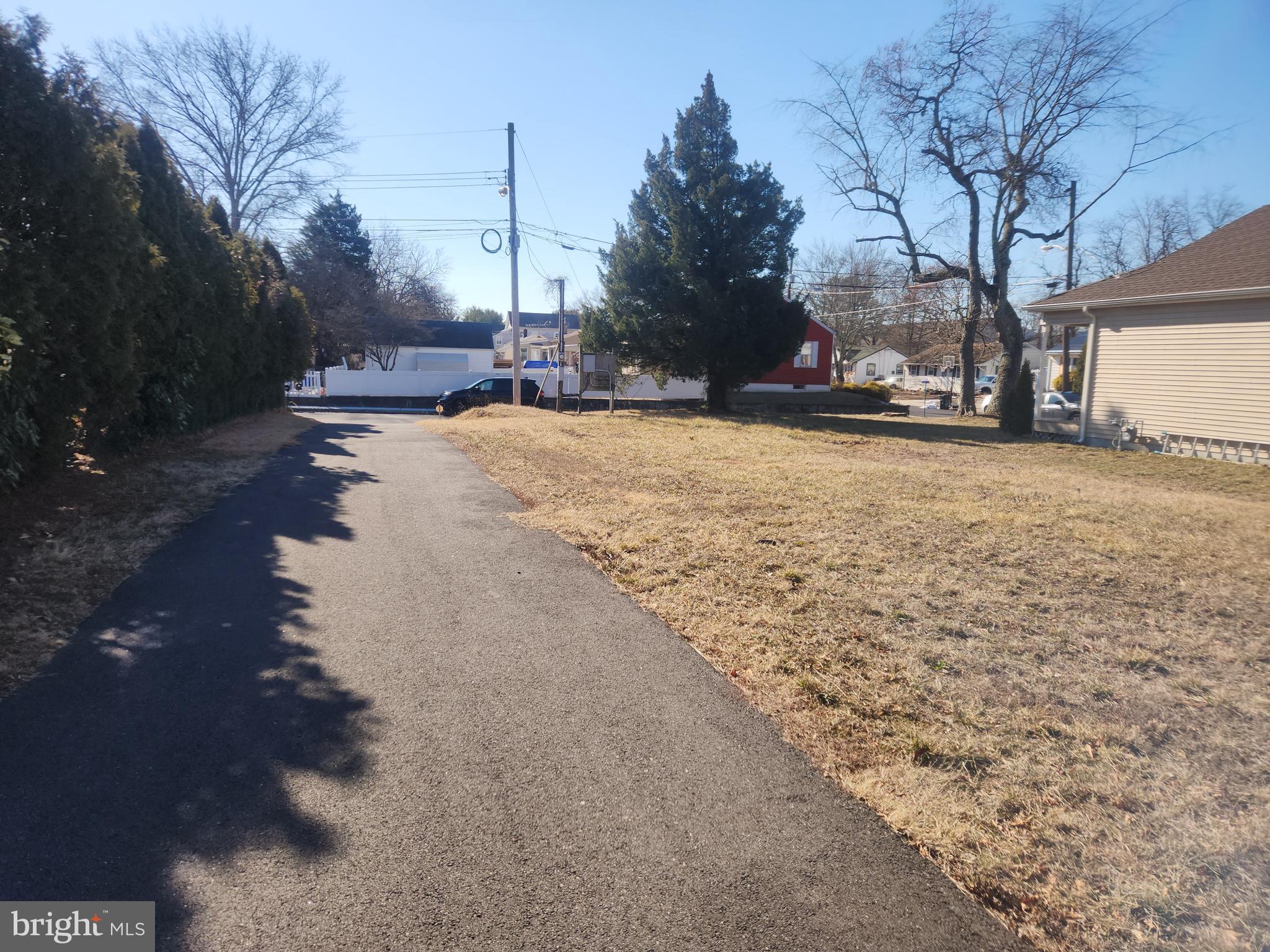 203 Platt Avenue Wrightstown, NJ 08562 - Photo 2 of 15 a view of road with with trees