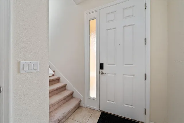 a view of entryway with wooden floor