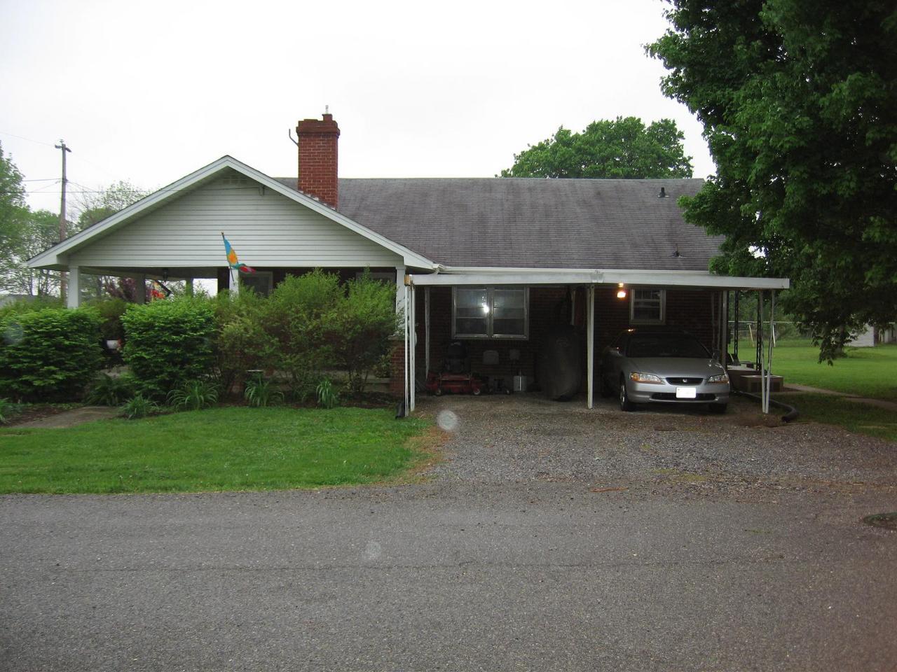 203 Knoll Road Roanoke, VA 24019 - Photo 10 of 11 a view of a house with a yard and large tree