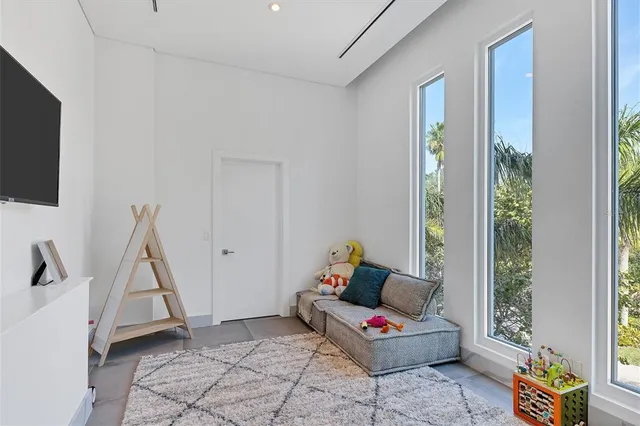 a bedroom with a bed and a bathroom