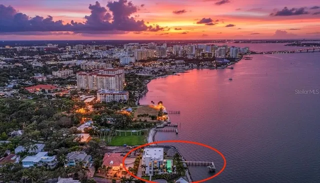a view of a swimming pool with a lounge chairs