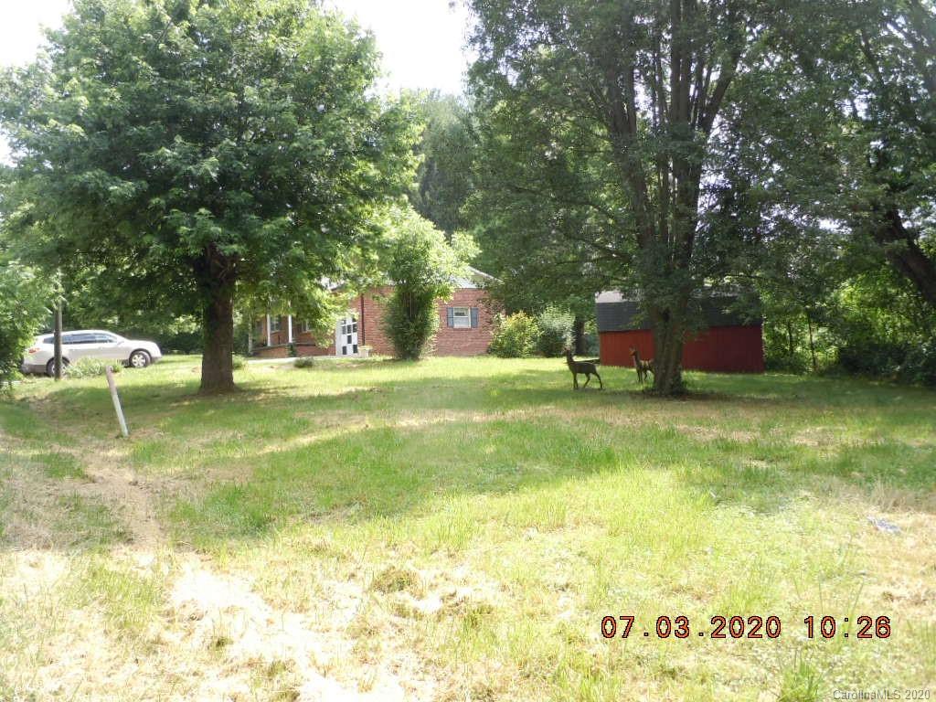 26 Thompson Cove Road Clyde, NC 28721 - Photo 3 of 16 a view of yard with swimming pool and trees