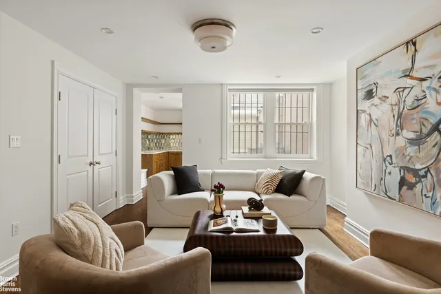 a bathroom with a sink mirror and a shower