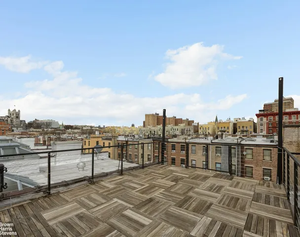 a front view of a building with many windows