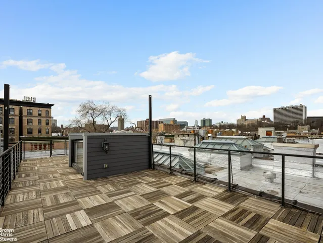 a view of a terrace with sitting area