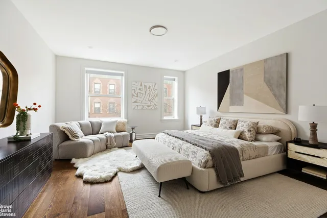 a room with furniture and wooden floor