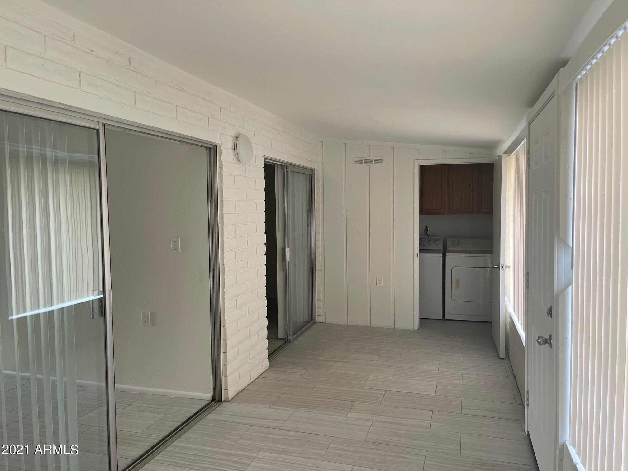 12847 North 113th Avenue, Unit 14 Youngtown, AZ 85363 - Photo 3 of 10 a view of an empty room