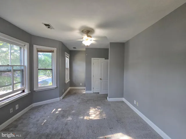 a view of a window in an empty room