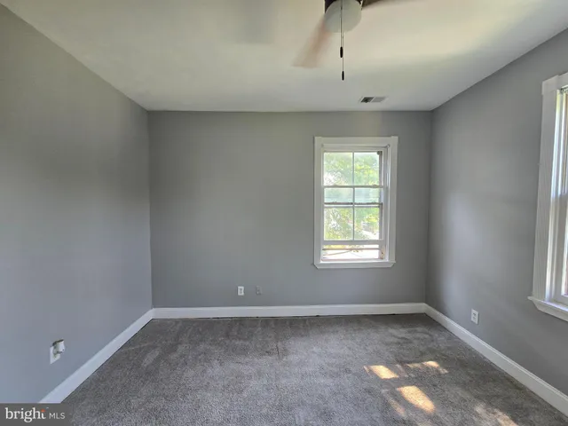a view of a garden with houses